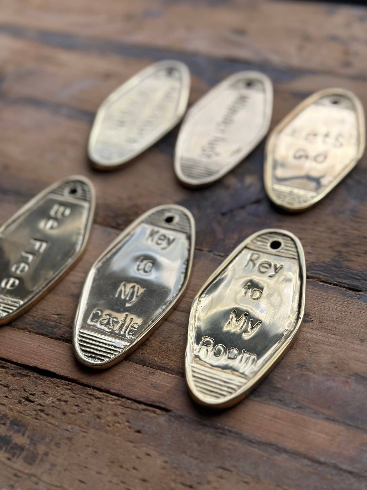 The Global Swap Shop - Brass Keychains