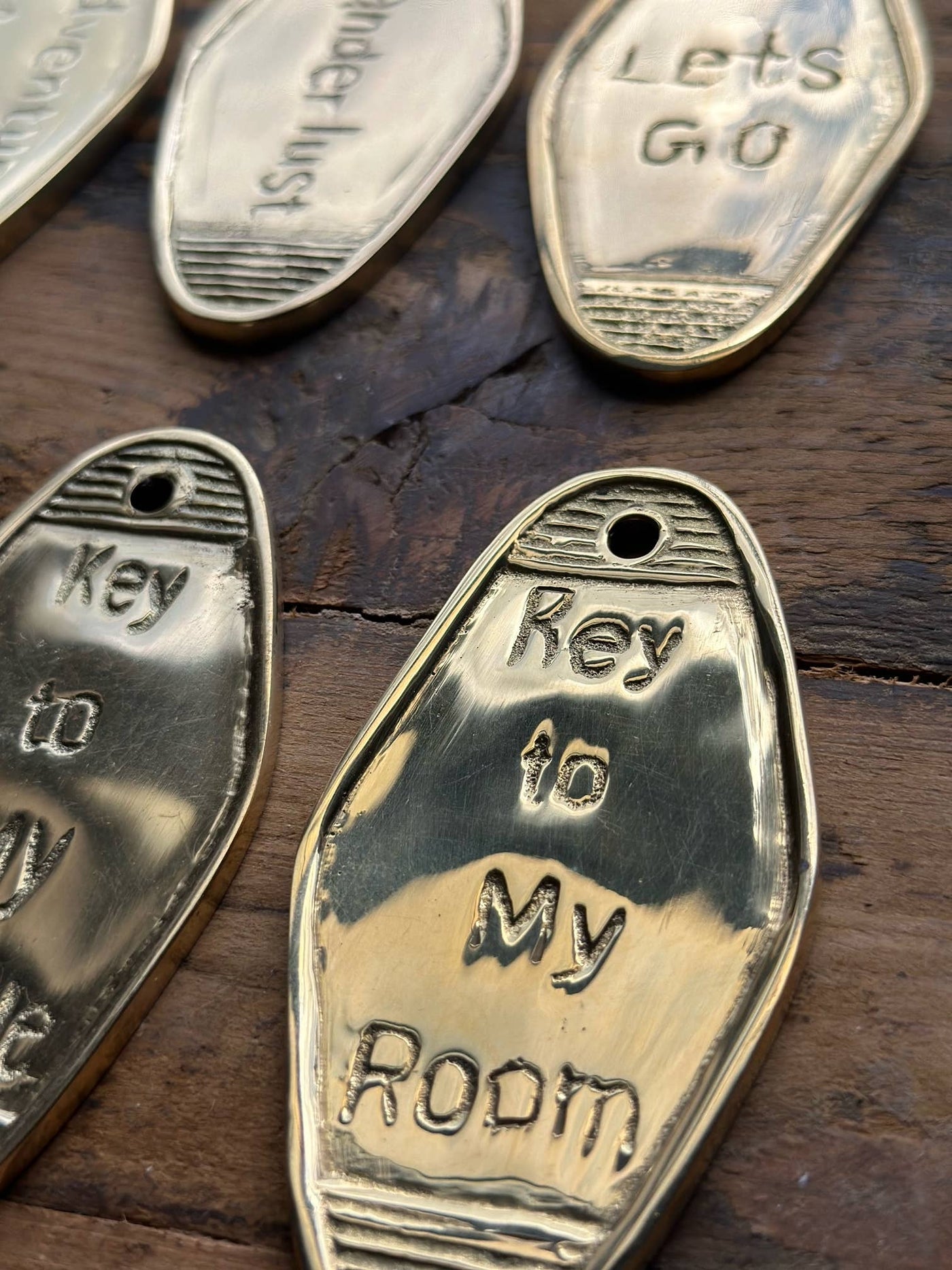 The Global Swap Shop - Brass Keychains